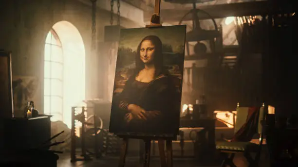 Photo of Renaissance Aesthetics: Empty Shot with no People Presenting the Famous Painting of the Mona Lisa Resting on an Easel Stand in an Old Art Workshop. Recreation of Leonardo Da Vinci's Creative Space