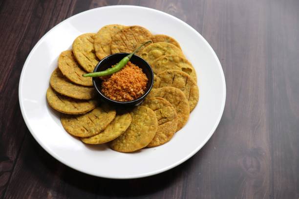 istock Crispy and crunchy methi mathri is a popular tea time snack in north India. It's especially popular during the Diwali festive season. It's a savory cracker or Masala puri. Copy Space. 1803977767
