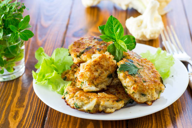 istock cooked vegetarian fried cauliflower cutlets, in a plate . 1803981024