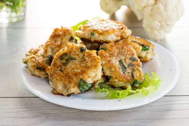 istock cooked vegetarian fried cauliflower cutlets, in a plate . 1803981042
