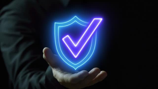 Businessman hand shows identity proofing icon for the security protection system on virtual screen. Certified guarantee approval or secure access system concept, Quality assurance of business service.