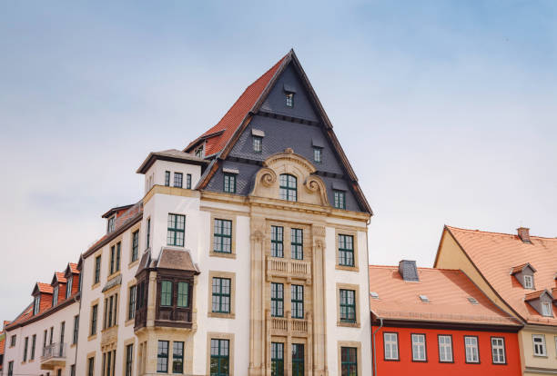 spring trip to Europe. Travel and German sightseeing locations. scenic view to facade of old historic houses somewhere in Erfurt city, Traditional half-timbered houses makes cozy and fairy tail mood
