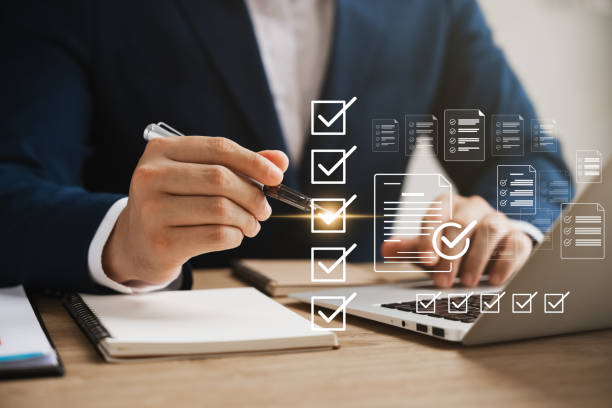 istock businessman using a laptop. online survey with digital forms and checklists. technology and strategy for success in the business modern world. efficiency, Transparency in organizations and companies 1803992071
