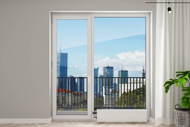 istock White plastic door with window in the new room 1803993240