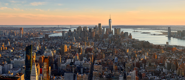 Aerial view of New York CIty. The panoramic view includes Midtwon and Lower Manhattan skyscrapers at Sunset