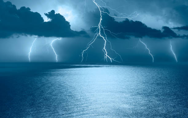 istock Beautiful landscape with lightning over the calm sea 1804005557