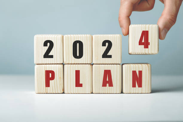 istock 2024 plan word written on wooden cubes 1804005812