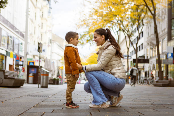 istock Mother and son cuddling in Vienna, Austria 1804006284