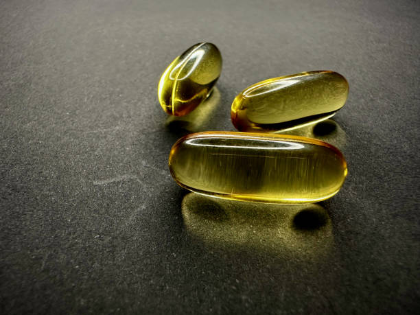 istock Fish oil in capsule - omega-3 1804006574