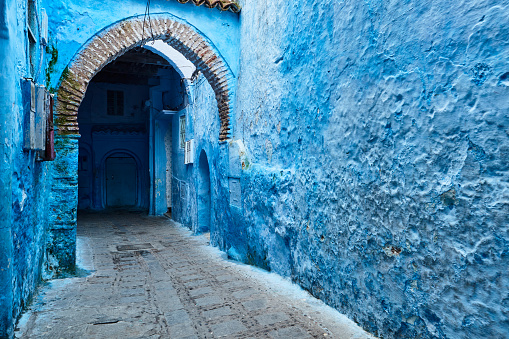 Street with archway in Chefchaouen, Morocco, Africa.