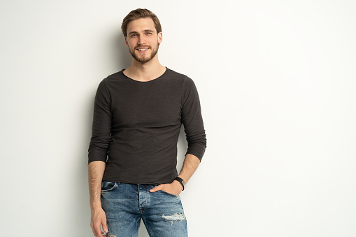 Portrait of happy casual handsome man smiling, Mid adult guy Isolated on white background, copy space.