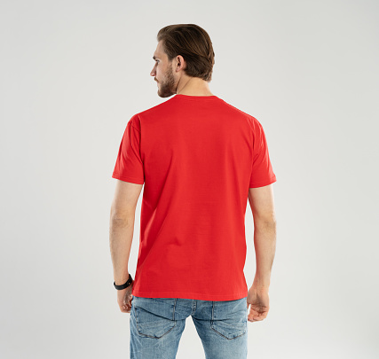 Shirt design and people concept - close up of young man in blank red t-shirt rear isolated. Mock up template for design print