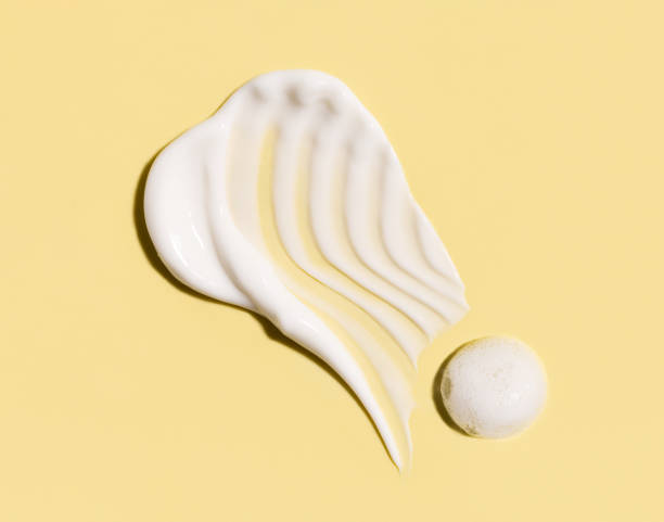 istock cosmetic smears cream texture on pastel background 1804050095
