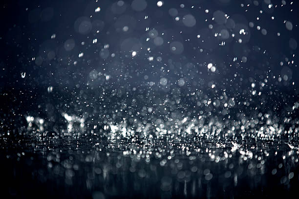 Defocus of raindrops and splatter - Background stock photo