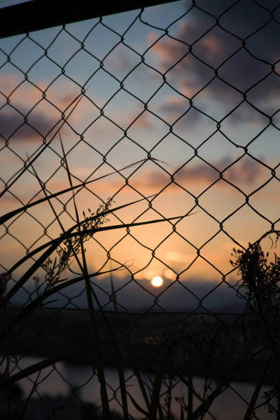 istock Beautiful orange sunset sky with clouds 1804069796
