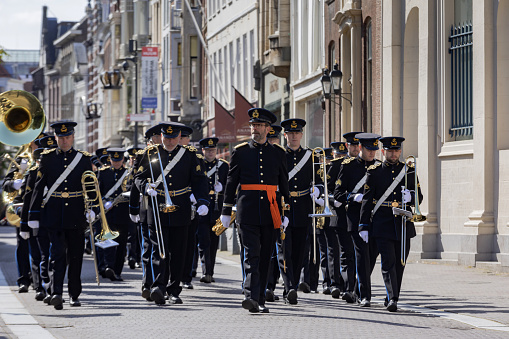 The Hague, The Netherlands - May 24, 2023; official ceremony in front of Noordeinde Palace on Wednesday mornings when new ambassadors visit King Willem-Alexander and offer him their letter of credence. The audience includes a ceremony that can be followed from Noordeinde street. The ambassadors arrive by state coach, escorted by horsemen from the Royal Netherlands Mounted Police.