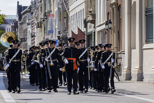 The Hague, The Netherlands - May 24, 2023; official ceremony in front of Noordeinde Palace on Wednesday mornings when new ambassadors visit King Willem-Alexander and offer him their letter of credence. The audience includes a ceremony that can be followed from Noordeinde street. The ambassadors arrive by state coach, escorted by horsemen from the Royal Netherlands Mounted Police.