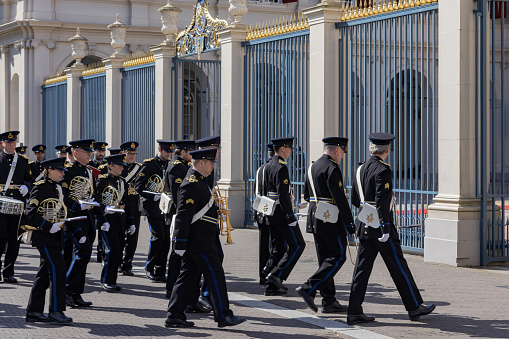 The Hague, The Netherlands - May 24, 2023; official ceremony in front of Noordeinde Palace on Wednesday mornings when new ambassadors visit King Willem-Alexander and offer him their letter of credence. The audience includes a ceremony that can be followed from Noordeinde street. The ambassadors arrive by state coach, escorted by horsemen from the Royal Netherlands Mounted Police.