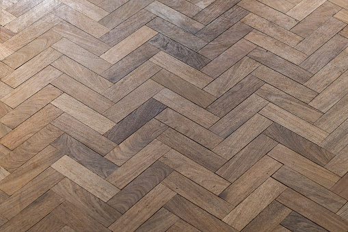 An original parkay, parquet, flooring in Oak tessellated diagonal, geometric mosaic of individual wood pieces, decorative flooring, parquet pattern