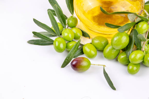 istock Green olive and olive oil isolated 1804092968