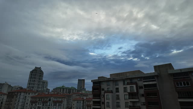 Apartment buildings and sky in istanbul timelapse