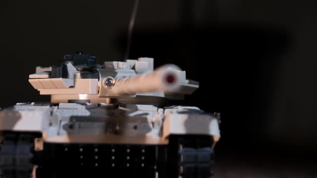 radio-controlled toy tank that drives, rotates turret and fires from the muzzle