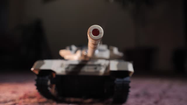 radio-controlled toy tank that drives, rotates turret and fires from the muzzle