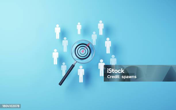 Target Icon Selected In Metallic Magnifying Glass On Soft Blue Background Stock Photo - Download Image Now