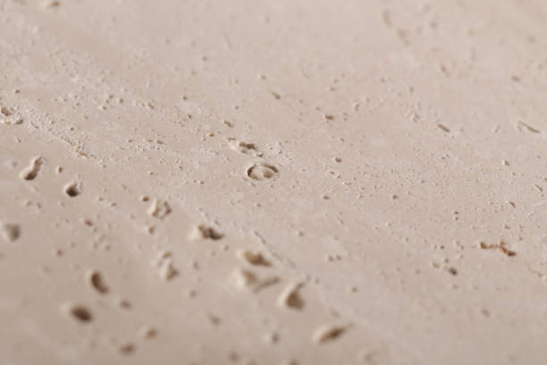 istock Natural travertine stone background, close up 1804116204