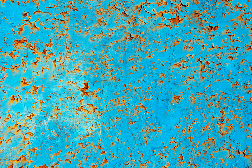 Blue rusty metal texture background close up.