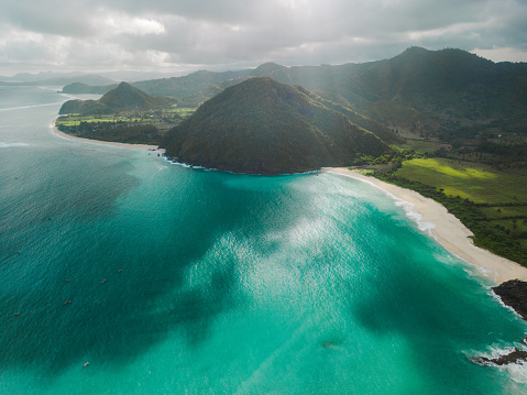 Scenic aerial view of  crashing waves on Selong Belanak beach on Lombok