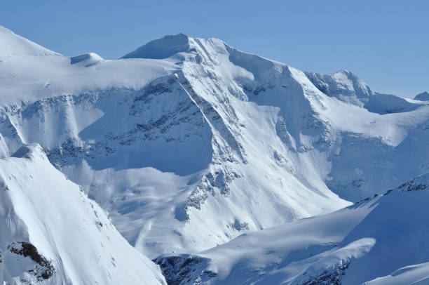 istock Snow covered mountain slopes in the Alps 1804123975