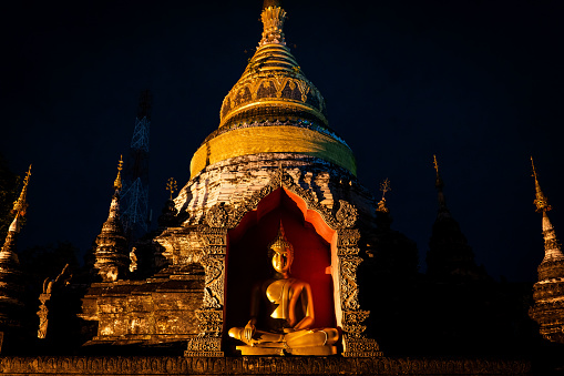 A general view of a Golden Buddha statue on the grounds of Wat Buppharam in Chiang Mai, Thailand.