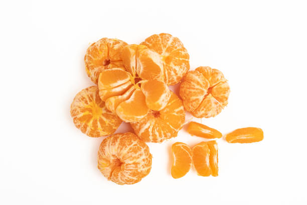 istock Peeled tangerines on a white background 1804132234