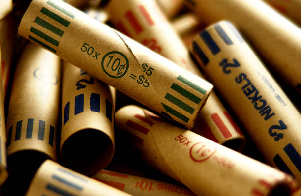 Paper coin rolls stock photo