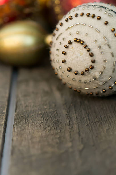 istock Christmas Ornaments on rustic wood slats 180414385