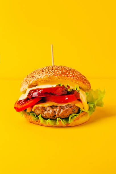 istock close-up of a hamburger on a yellow background 1804144914