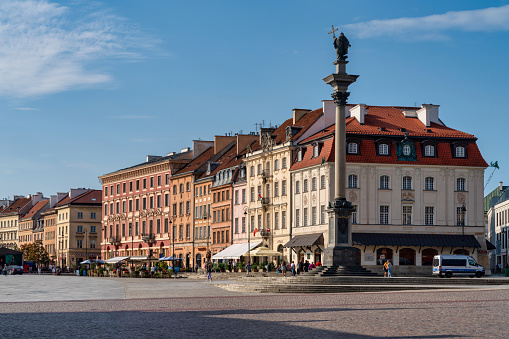 Krakow (Cracow), Poland - September 30, 2018: Group of people on Florianska Street in the Old Town with view to the St. Florian Gate, city landmark.