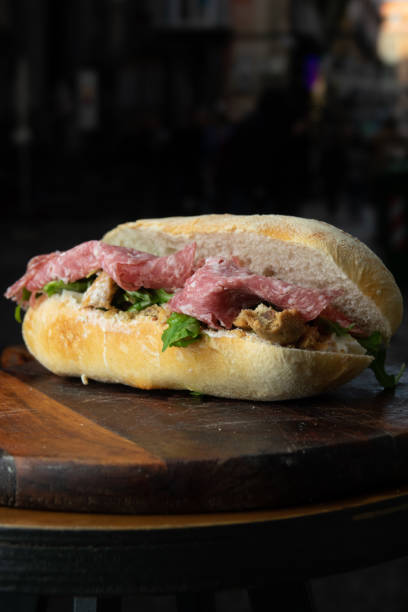 istock Sandwich with salami, cheese and rocket salad 1804156433