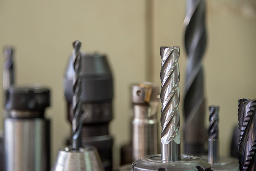 Close-up scene group of the used flat or square solid end mill tools. The  cutting  tool for machining center.