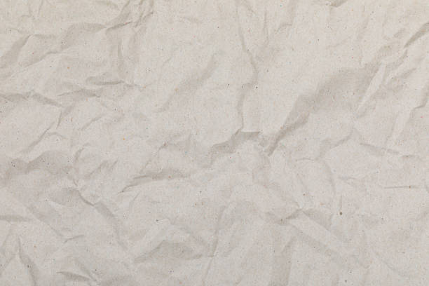 istock Crumpled kraft paper textured background 1804162028