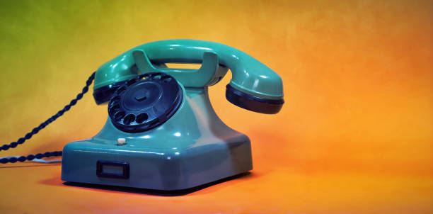 A vintage cable, rotary dial, telephone set