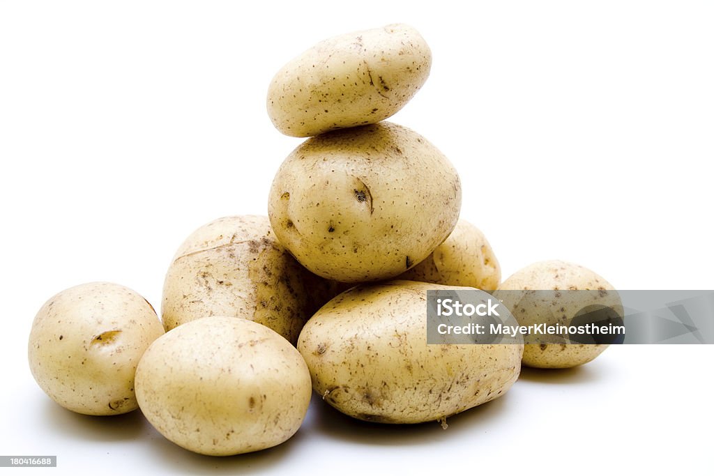 Fresh potatoes Fresh potatoes on white background Food and Drink Stock Photo