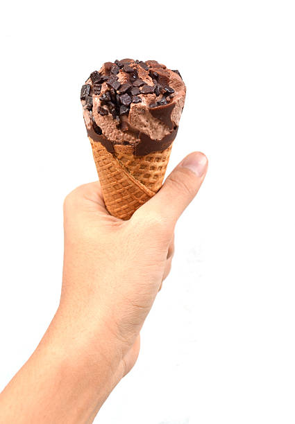 istock Hand holding ice cream chocolate white background 180417326