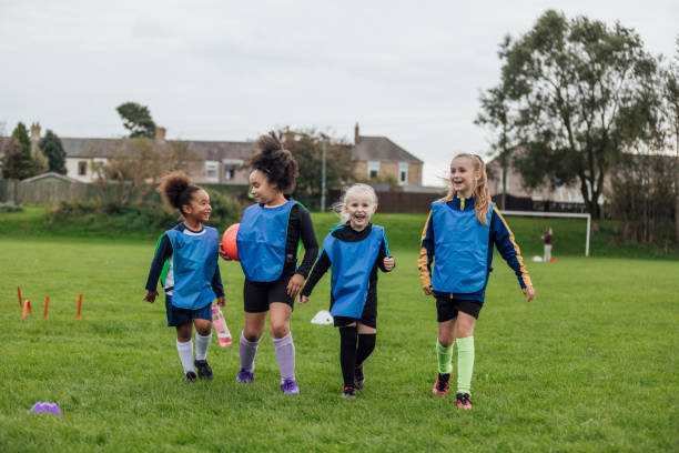 istock Friends at Football Practice 1804174007