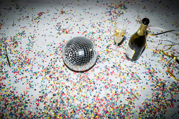 istock Champagne bottle and disco ball 1804178313