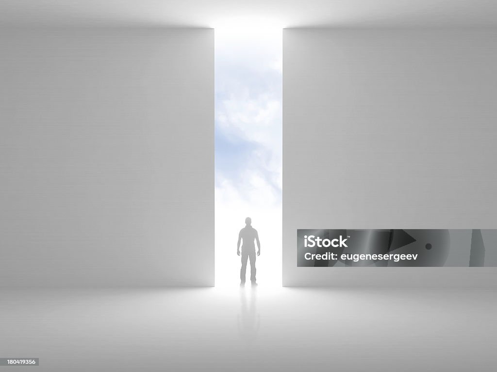 Abstract empty interior with opening and a man Abstract empty interior with opening in the wall and a man standing in the light Door Stock Photo