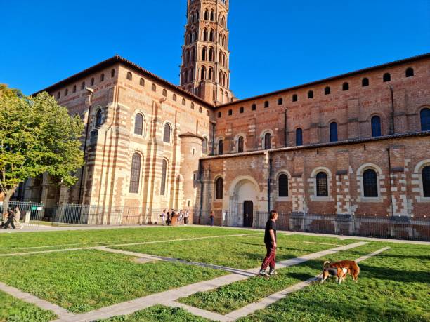 The Basilica of Saint-Sernin is a church in Toulouse. The image shows the Bell tower (The lower part Romanesque and Gothic upper part, captured during autumn season.
