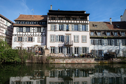 Sunrise view of a square (place de la petite etape aux vins), with half-timbered houses, in the medieval village Noyers-sur-Serein, Burgundy, France