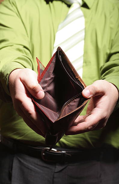 istock Empty wallet in male hands - poor economy 180421720